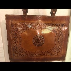 Vintage tooled leather brown handbag